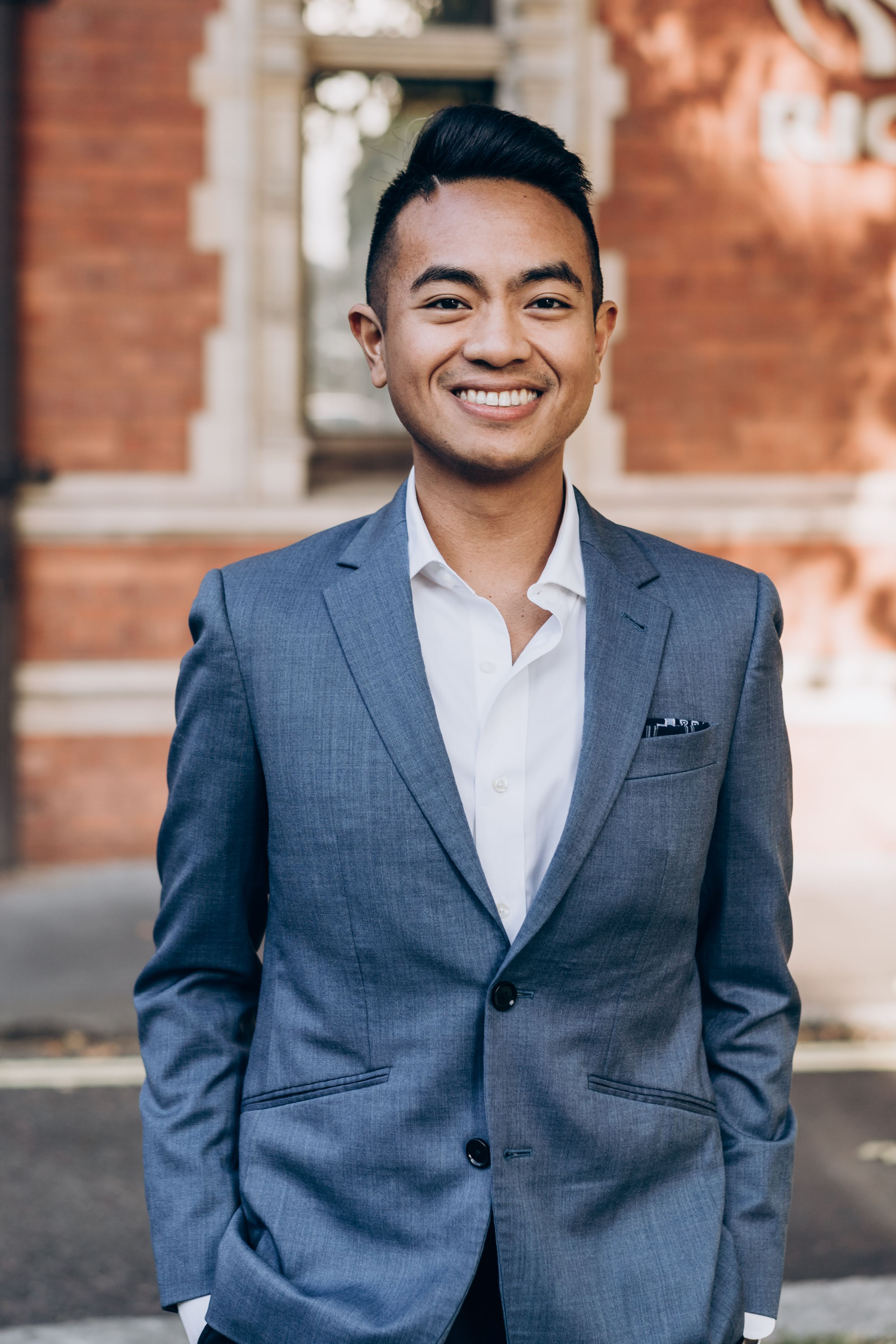 Portrait of Joe Naldo smiling outdoors